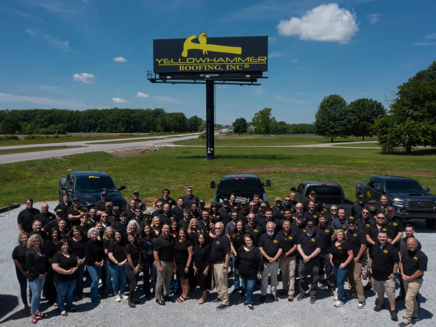 Yellowhammer Roofing team gathered together in Athens, Alabama