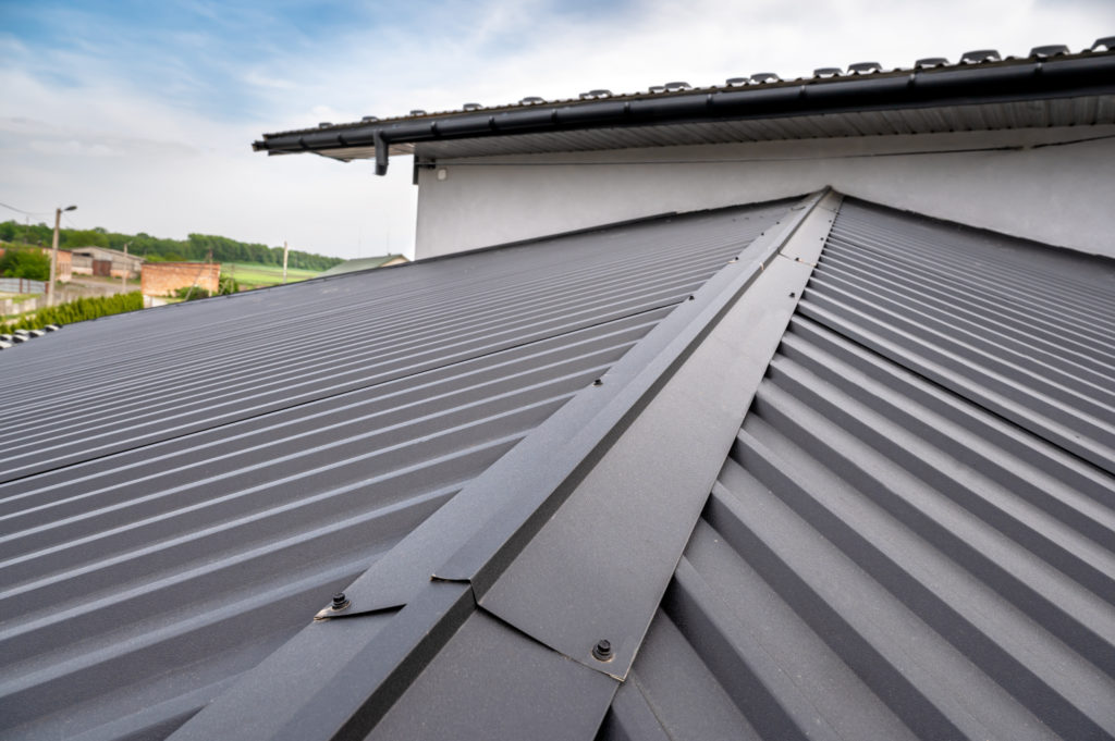 Image showing the peak of a metal roof.